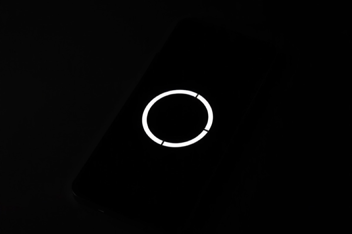 A smartphone with a circular progress ring glowing on its screen