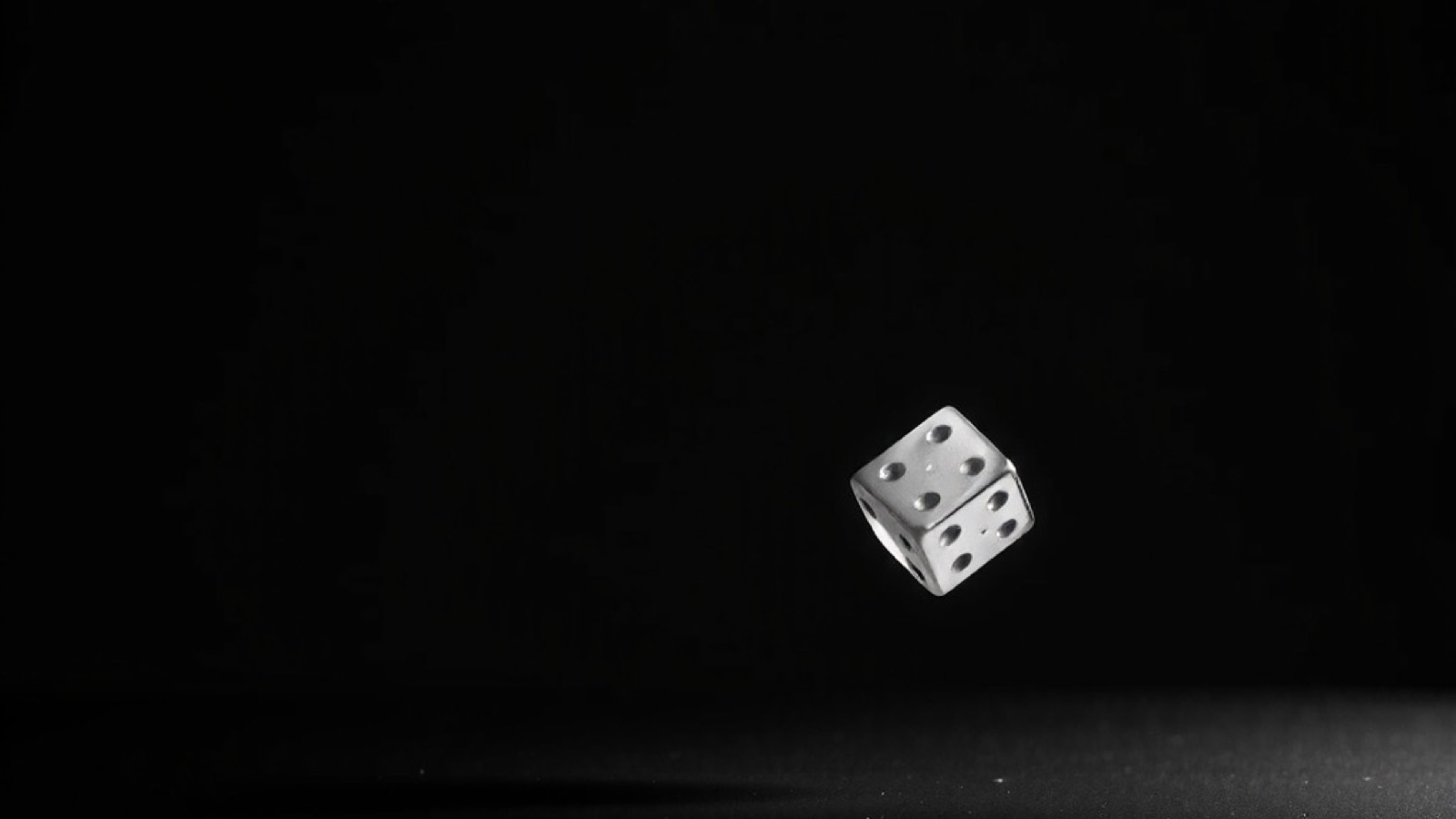 Translucent dice suspended mid-air